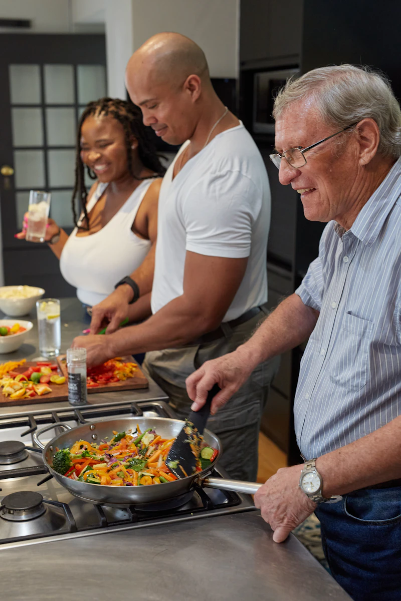 Australian senior preparing a high-protein meal with chicken, eggs, and legumes