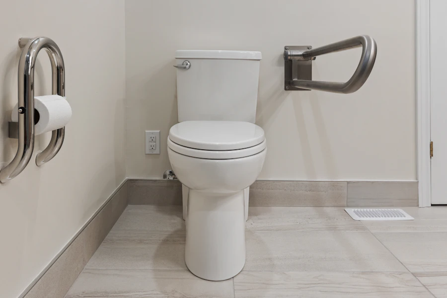 Bathroom grab rail and safety handrail fixture in a home, representing fall prevention for seniors