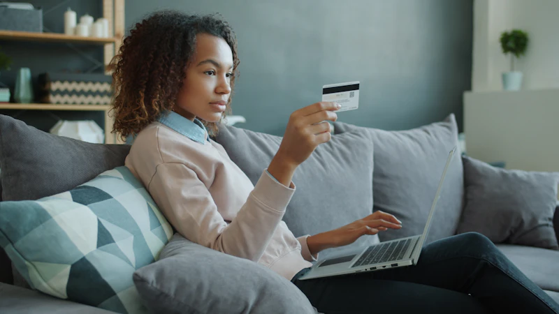 Senior woman browsing safely on a tablet, learning how to shop online with confidence