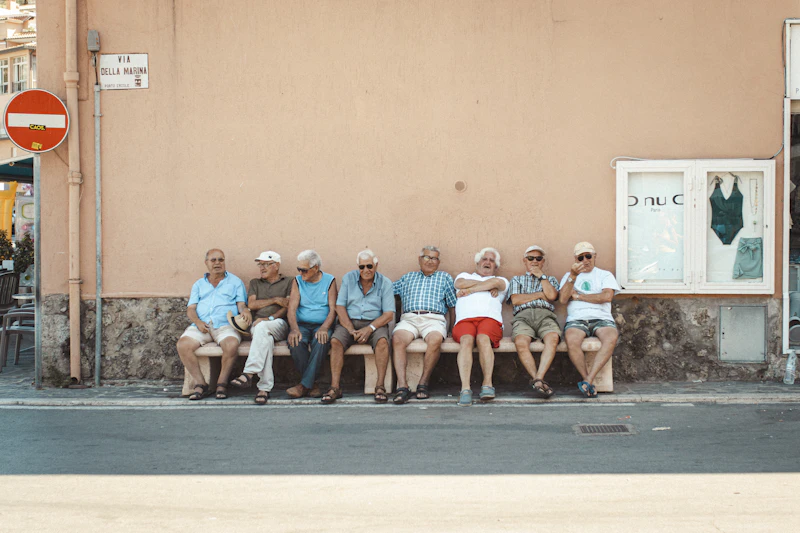 Group of retired travellers exploring a new destination together, enjoying a social travel club