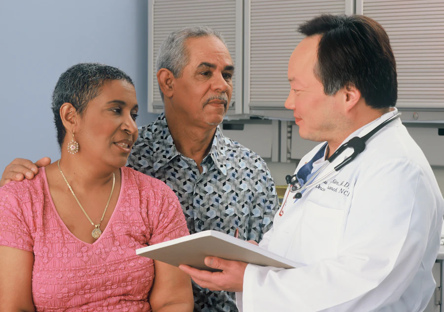 Senior patient in consultation with a doctor, representing when to seek medical advice about sleep